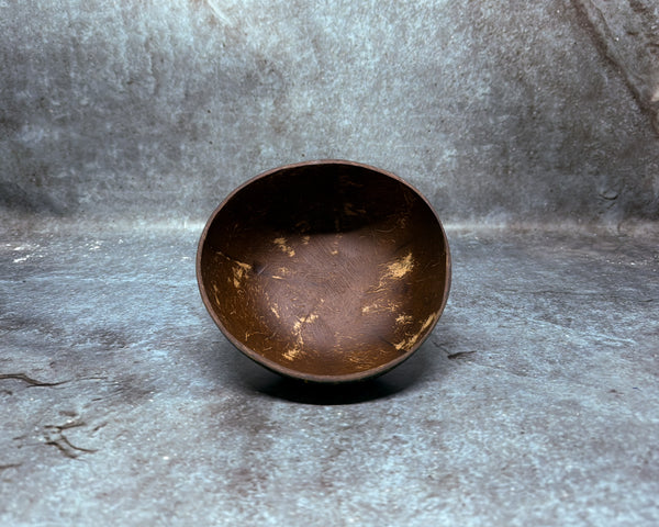 Coconut shell with green and gold