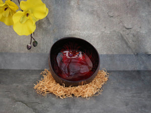 Coconut shell w-red&black streaks inside.